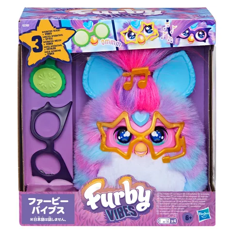 Furby Vibes Blue Razz in its box with star, cucumber and dark glasses
