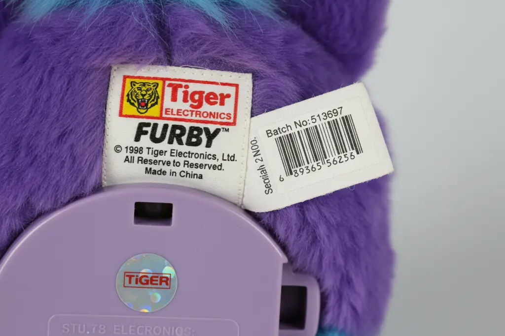 Close-up authentication details on genuine Tiger Electronics Furby