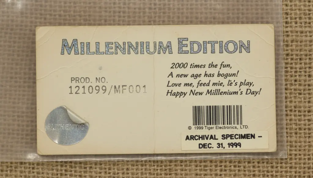 Close-up of Millennium Furby special edition tag showing commemorative text and production markings