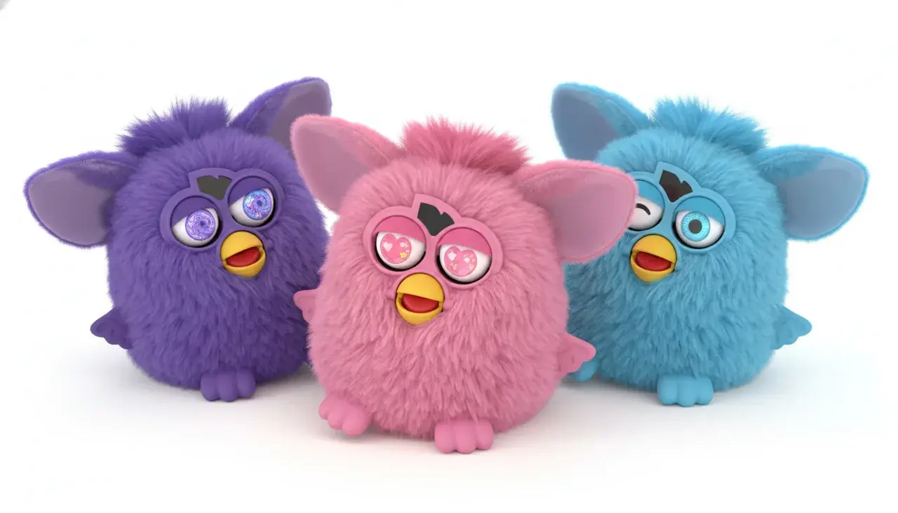 Colorful 2023 Furby toys displaying various interactive features and glowing eyes