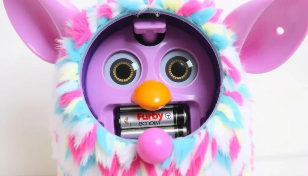 Image of a Furby Boom with a battery compartment open
